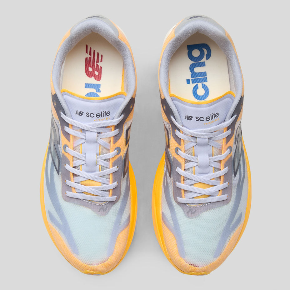 New Balance Tenis Infinion Elite V6 Masc — Lrjc/Lila